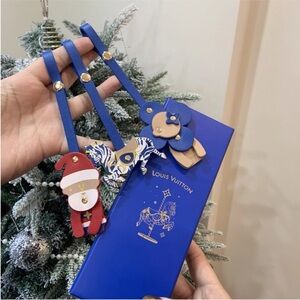 Louis Vuitton Festive Blue and Multicolor Bag Charms NIB and packaged.